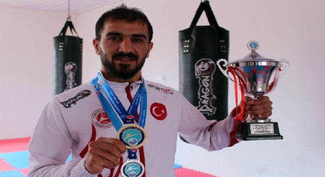 Futbolcuydu,  kick boksta Avrupa Şampiyonu oldu