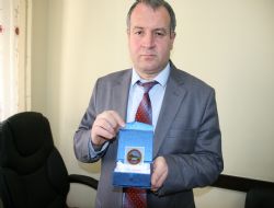 Selahaddin Üniversitesi'nden Asimder'e şilt